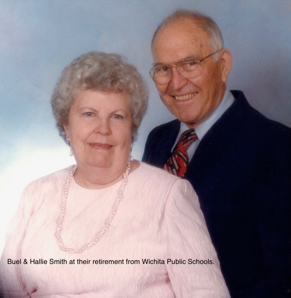 Smiling elderly couple at their retirement from Wichita Public Schools.