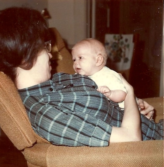 Seven week old Charles Kester looking into the face of his mother, Phyllis.