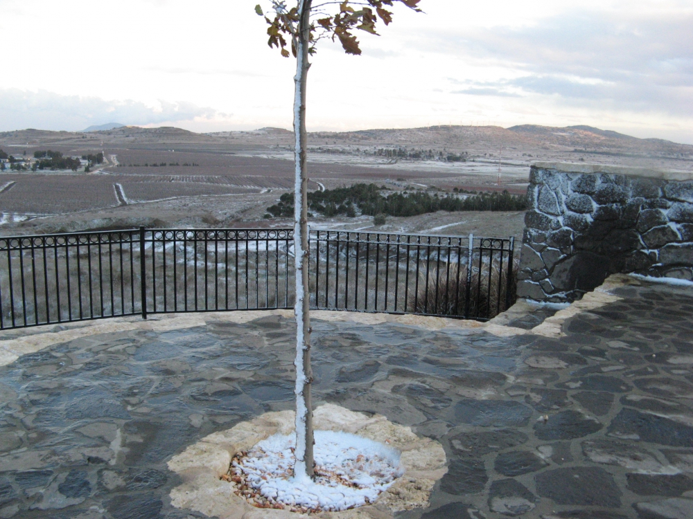 Looking out across snow dusted fields from platform in Golan Heights.