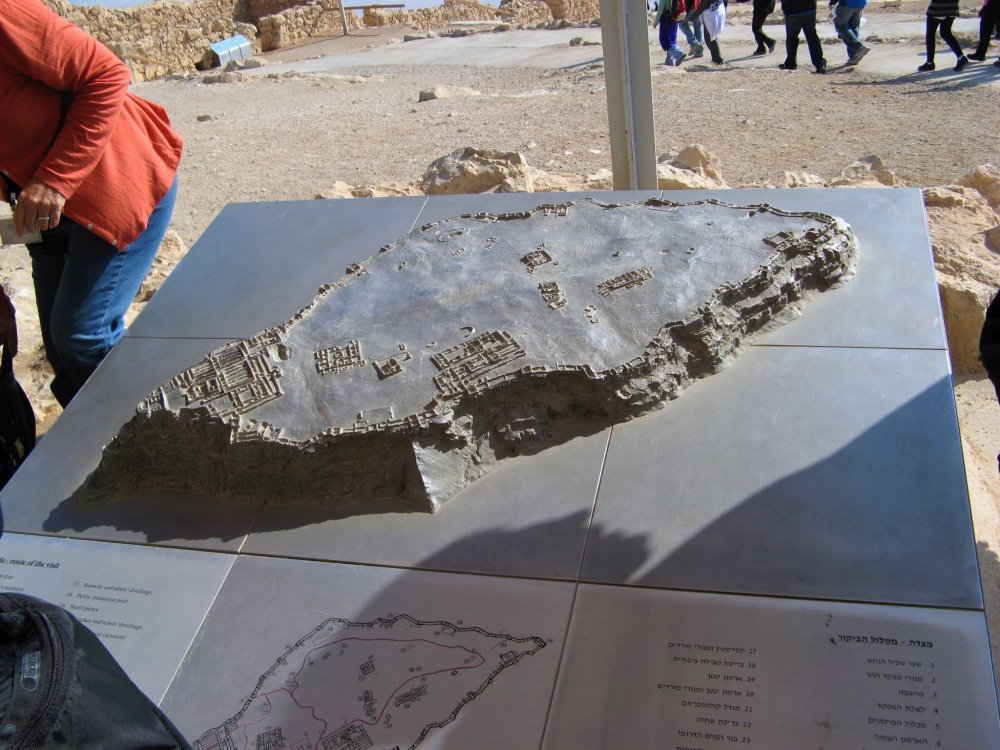 A metal model of the tall Masada rocky mesa in Israel.